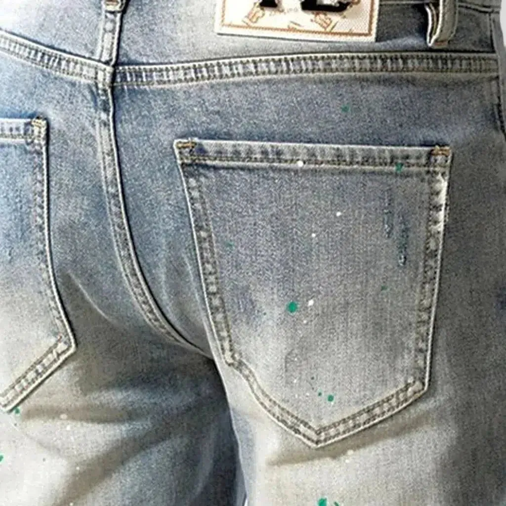 Grunge men's distressed jeans